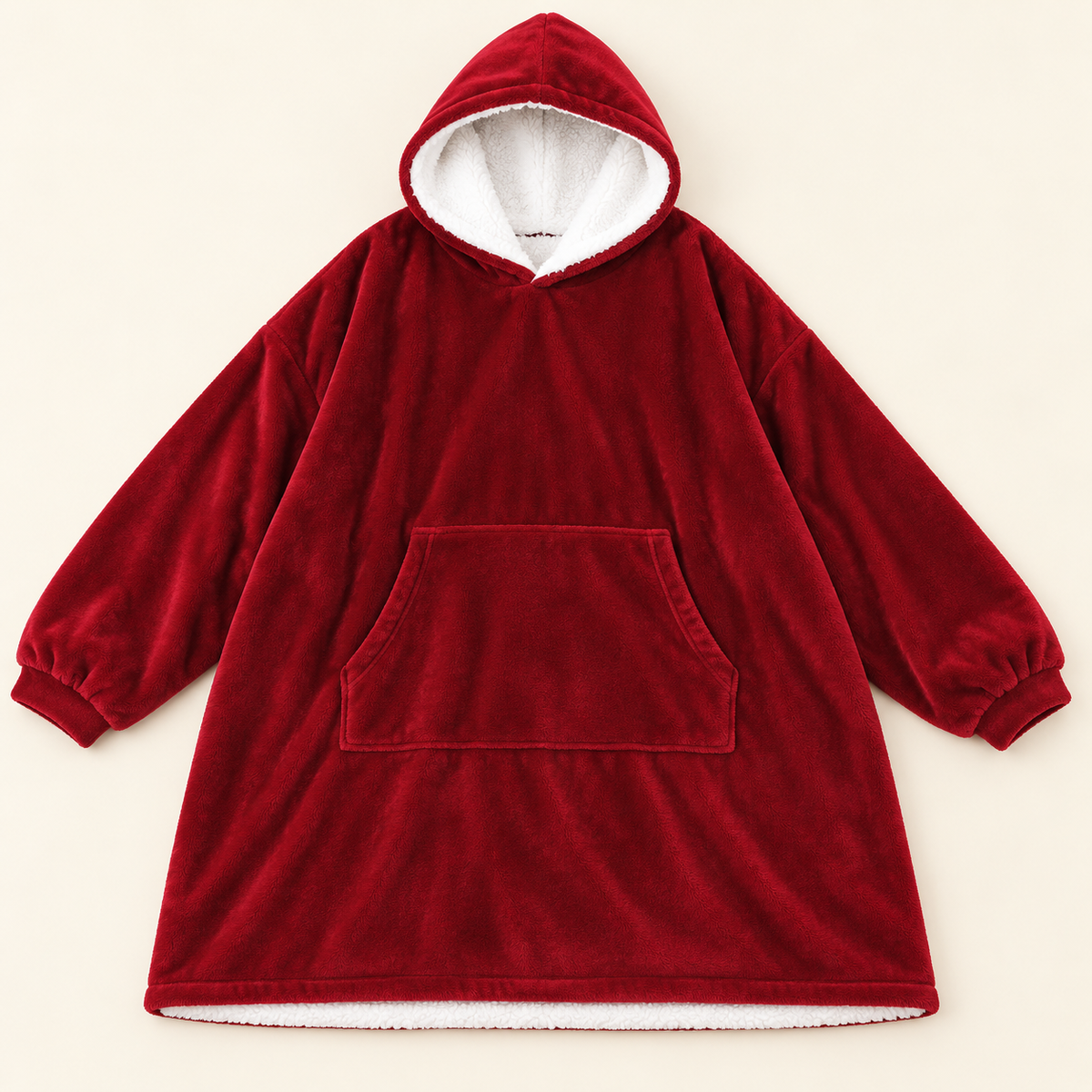 Mise en scène générée par IA d’après les photos fournisseur : pull plaid Douceur rouge présenté à plat sur fond crème.
